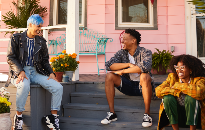 Group of friends sitting outside on porch
