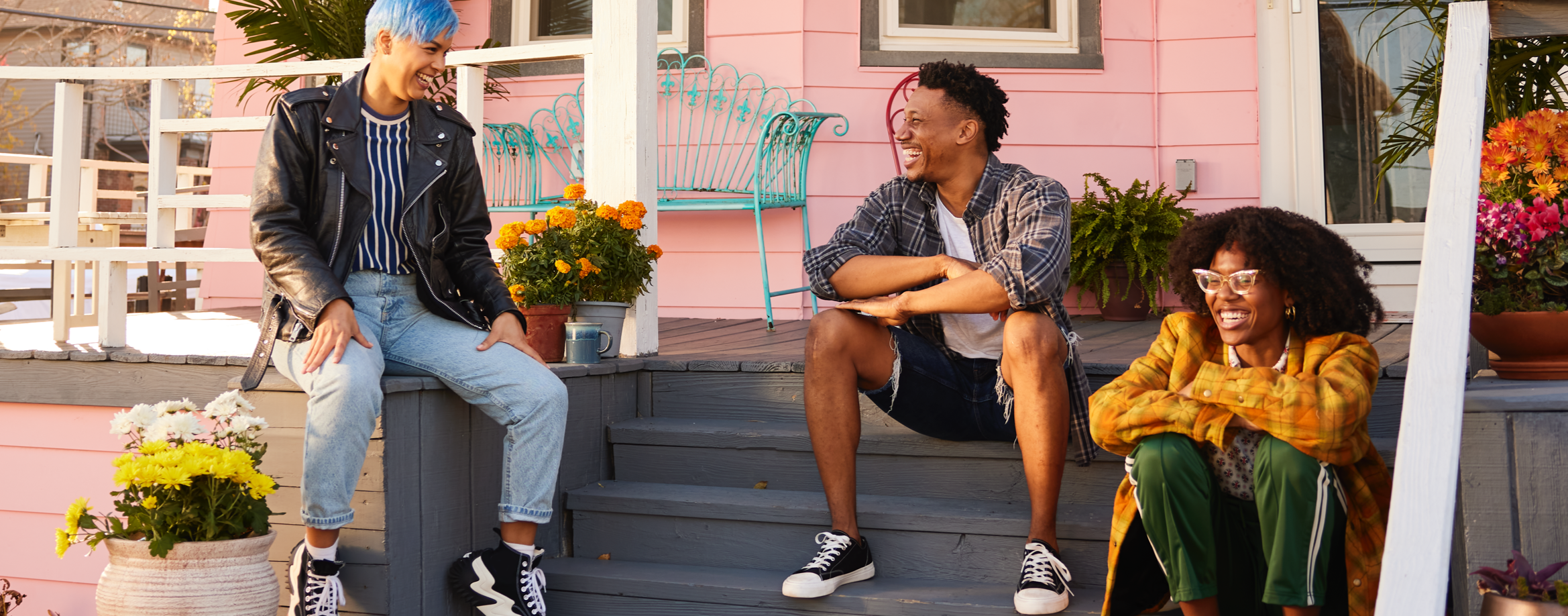 Group of friends sitting outside on porch