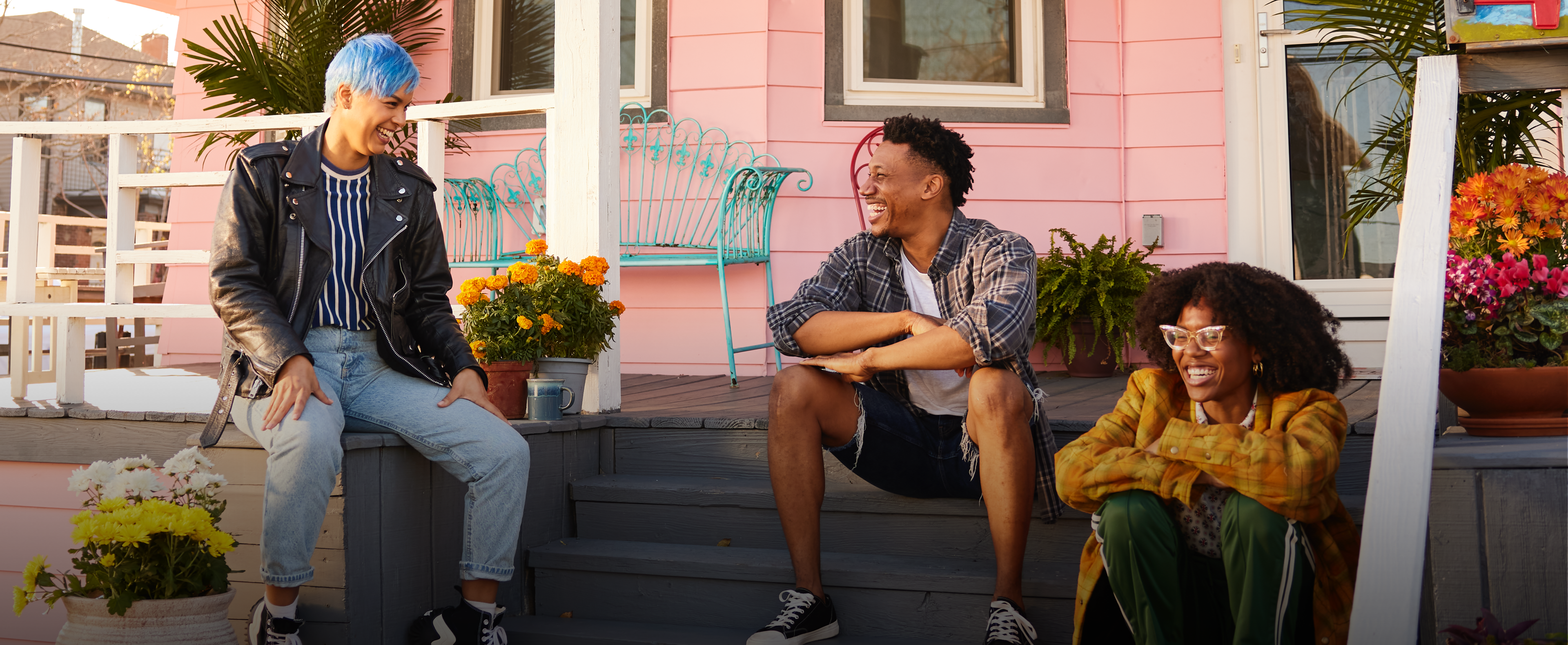 Group of friends sitting outside on porch